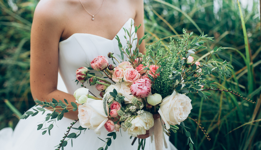 a bride holding a bouquet